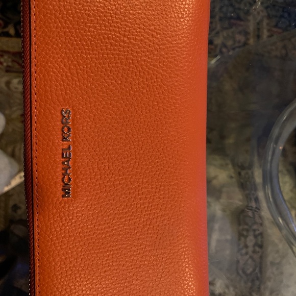 Michael Kors Other - Michael Kors Zippered wallet.leather throughout.